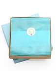 Geschenkverpackung Schachtel hellblau Seidenpapier Geschenk Wechseljahre oelfaktorisch körperöle