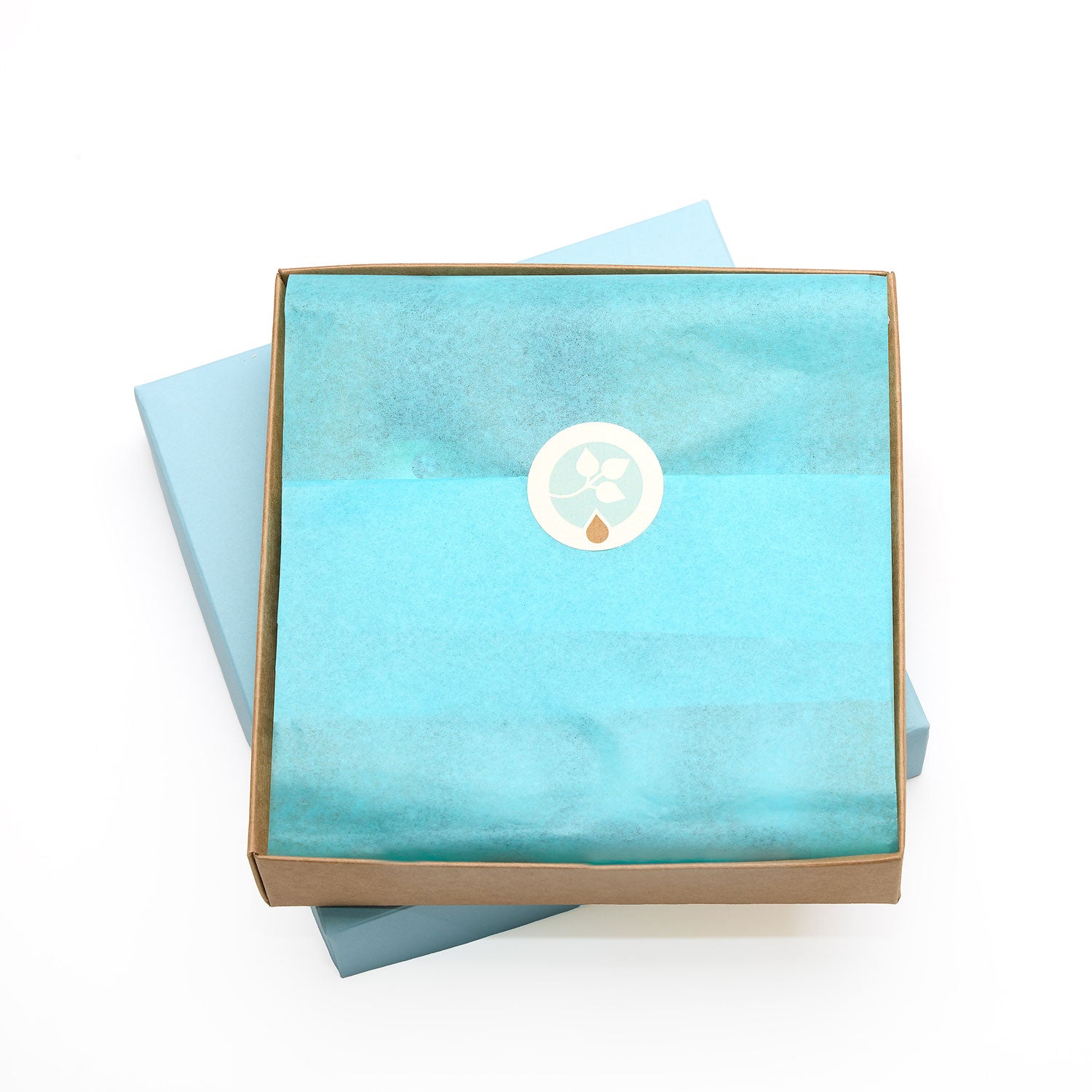 Geschenkverpackung Schachtel hellblau Seidenpapier Geschenk Wechseljahre oelfaktorisch körperöle